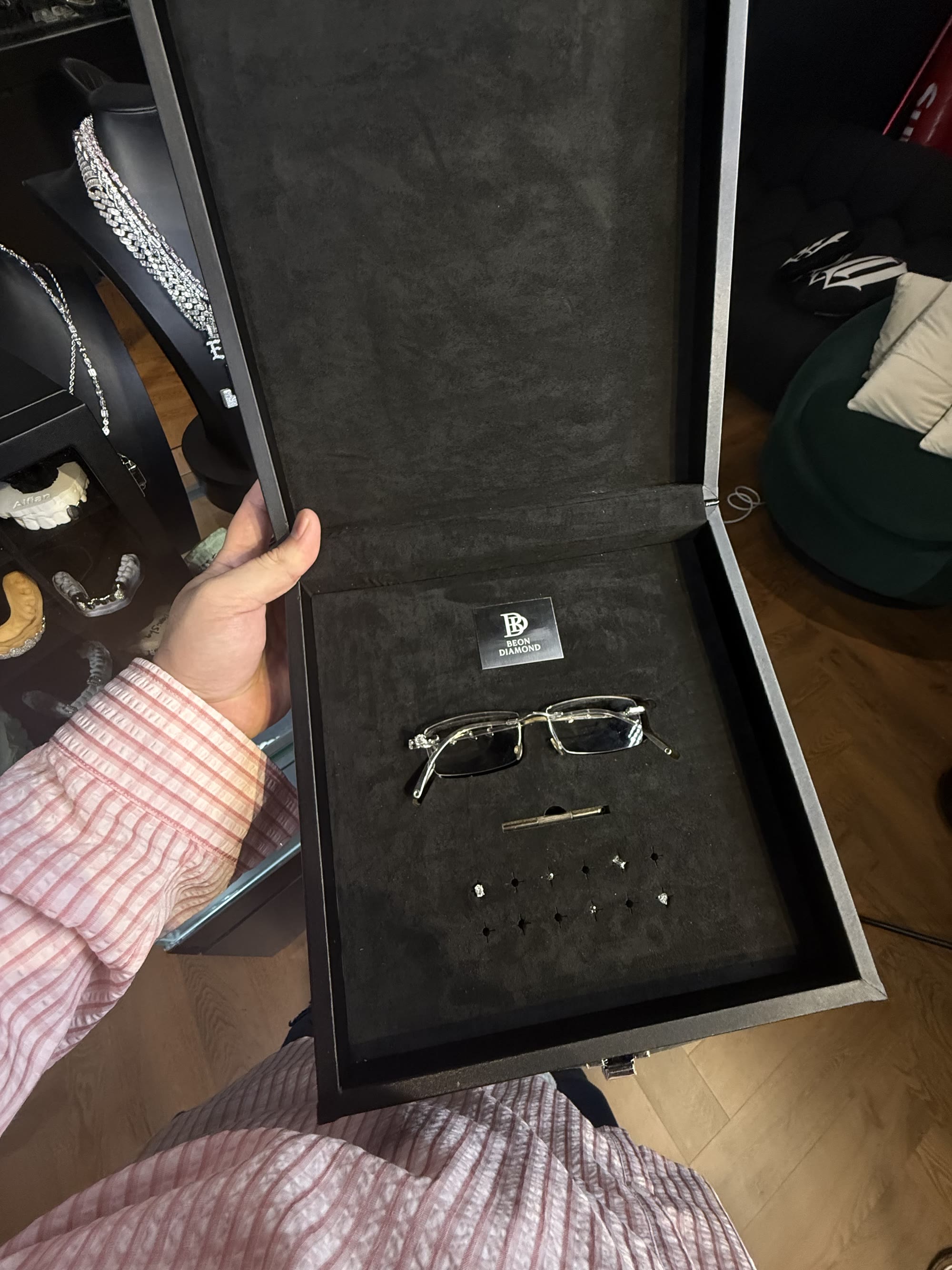 The current Beon case open in the showroom, full set visible